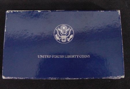 1986 United States Liberty Coins Set, Silver And H: Boxed Set Of 2 Mint Proofs For The Statue Of Liberty Centennial. Set Consists Of Silver Dollar, Half Dollar, Case, Original Papers And Box. Dollar Is .900 Fine And Half Is Normal Traditional Half Doll