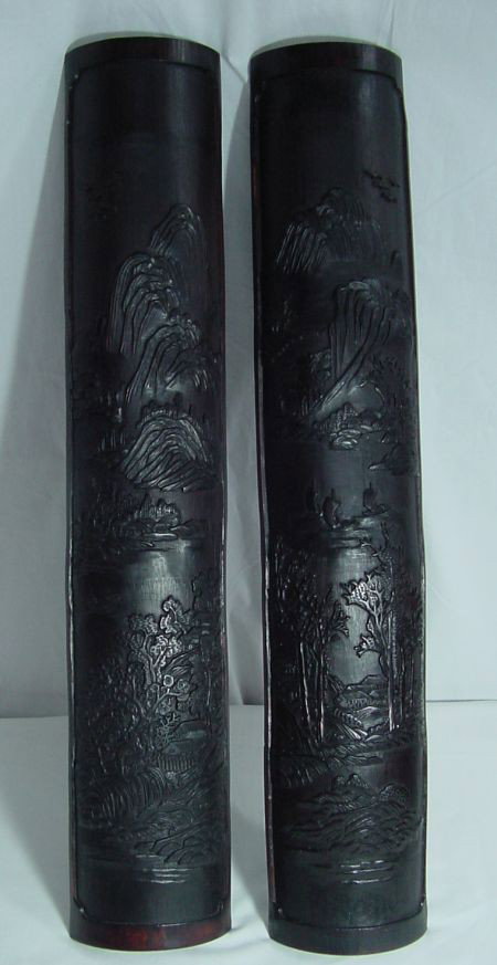 19th Cent. Chinese Bamboo Wrist Wrests: Pair of hand carved Bamboo 19th century wrist wrests with landscapes, 27 3/4" long, good condition. Almost a cameo like carving.