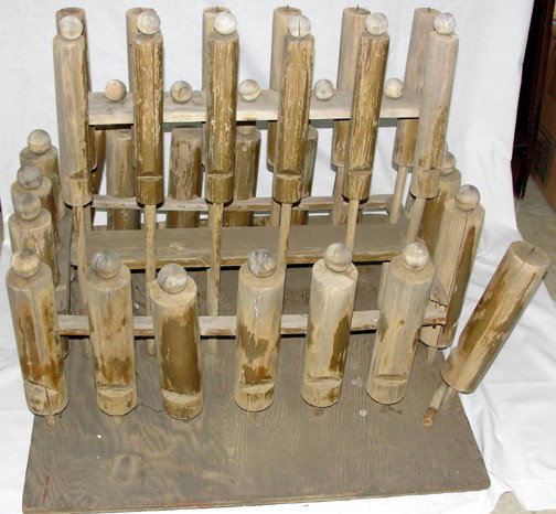 Folk Art Organ Pipe Whimsical Figure: Weathered sculpture from being outdoors, this was designed as a pipe organ's pipes as a whimsical figure, appears to be Pine, 33" by 32" by 30" tall. Unsigned, probably made in the 1960s or 70s.