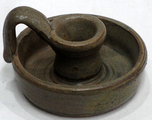 Lanier Meaders 1992 Pottery Candlestick: Handmade and signed by Lanier Meaders, 1892-1992, 10-30-92, chocolate glazed pottery candlestick with large drip area, applied handle, 3 1/4" tall by 5" wide.