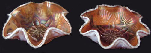 A Pr. Orange Opalescent Carnival Glass Candy Bowls: Fluted edges with a white or light blue opalescent edge and the outer back side being white opalescent, no marking, fans and floral center, 6" wide by 2" tall, you are bidding on a pair, likely to be