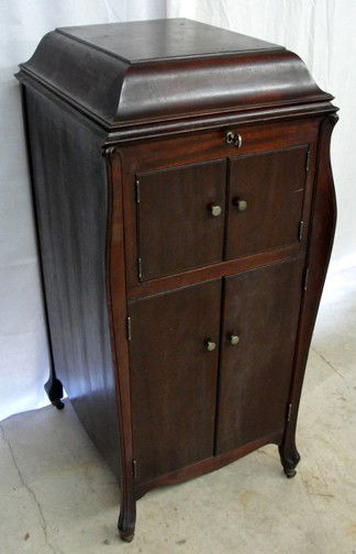 A Victrola Floor Model Record Player: Model number VV-XII602742, seemingly in good playing order, probably 1920s era, 20" wide by 22 1/4" deep by 43 1/2" tall, cabinet is really attractive and stylish for the time period.
