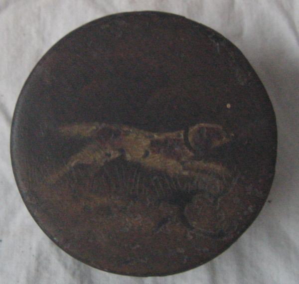 A 17th Cent. Lacquer ware Snuff Box: A running dog is shown on the round lid of this 2 1/4" round black lacquer box by 3/4" tall, all original condition, old notation inside a name Snuff Box 1640, and it very well could be this old. Very