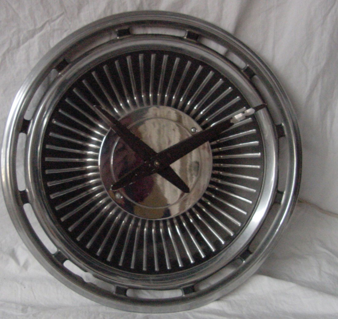 A 1960s Lincoln Advertising Clock: Made for dealers in the early 1960s, this Lincoln Continental clock came from the Estate of Marion Pickle in Knoxville, Tennessee. Mr. Pickle floor planned entire car lots in the 1960s and 70s, this h