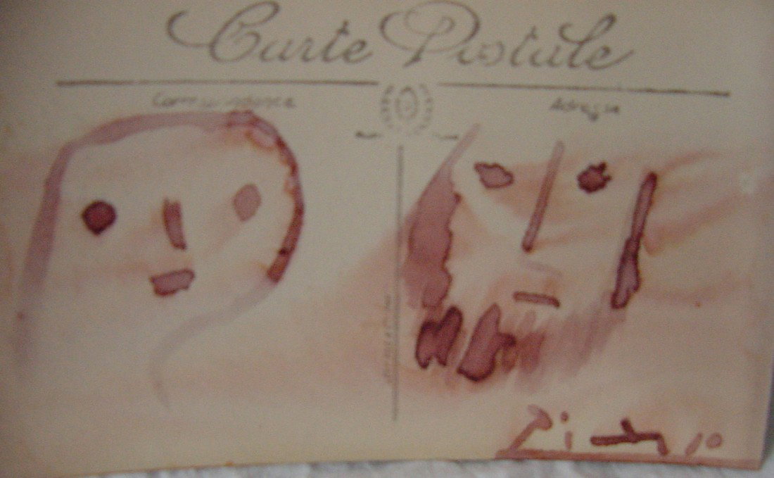 A Pablo Picasso Felt Tip Drawing: Red felt marker on a French post card, 5 1/2" wide by 3 1/4" tall, showing a female face on the left and on the right is a bearded man.. Signed lower right Picasso. Red coloration around the faces. Fr