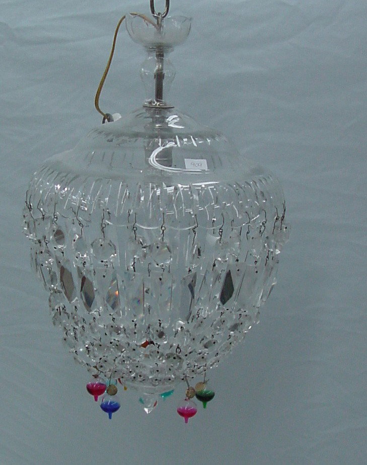 A Cut Glass Ceiling Light Fixture: If it is not Waterford, its close, no signature, 20" tall by 11" wide, lots of cut beads, reflective surface, high quality glass.
