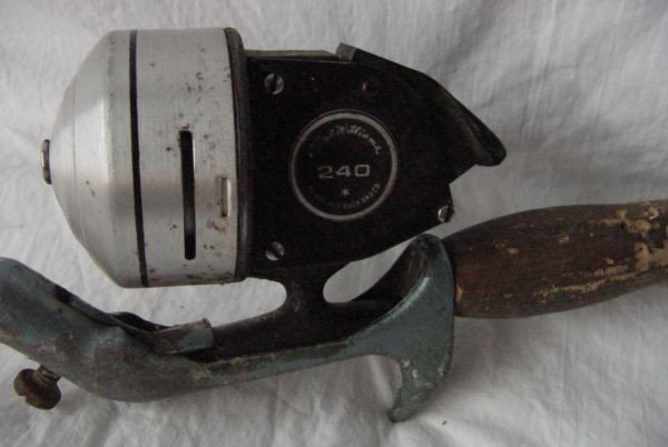 A Ted Williams Rod & Reel: Reel is signed Ted Williams 240, appears to be here, some wear to the cork handle, otherwise good condition. Approximately 5 1/2 feet long.