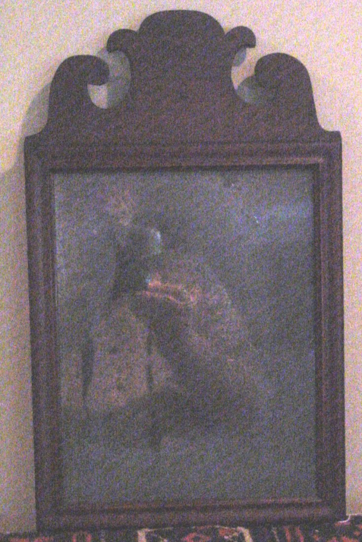 A Mahogany Queen Anne Mirror 18th Cent.: Seemingly all original, 1770-1790, Mahogany on Pine, blind mirror that is still visible, wooden hand planed back, even the old nails seem to be original. 8 1/4" wide by 10 3/4" tall mirror size, frame