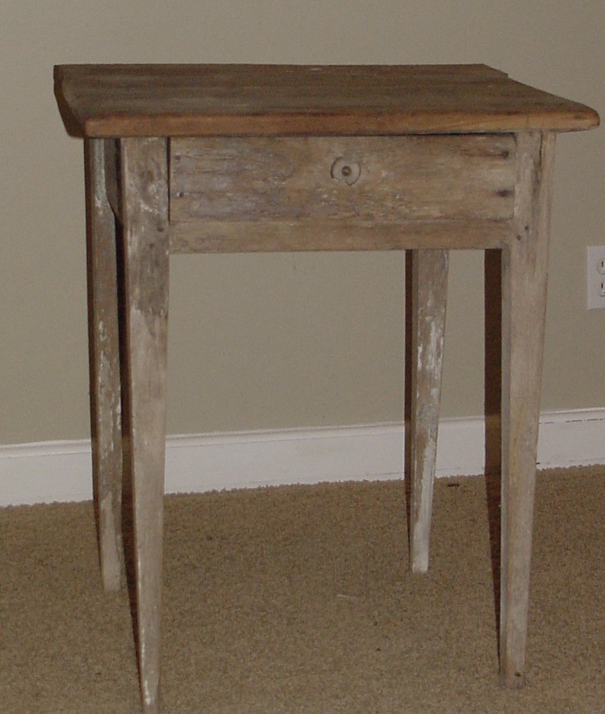 A Poplar 1 Drawer Table: Tapered legs, one drawer, replaced top, traces of white paint in the legs, great primitive, found in Eastern Tennessee, structurally good condition, 30" tall by 24" wide by 23" deep.