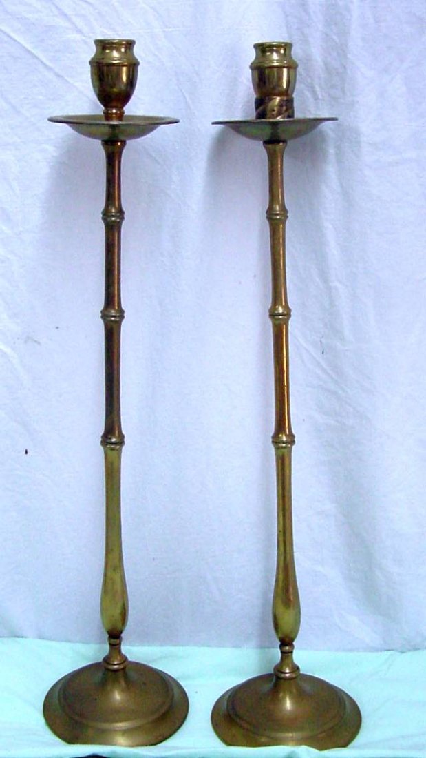 Tall Brass Candlesticks: Bamboo columns, 1890-1910 era, one stabilizer brass ring under one of the candle holders, large original drip pans, no visible makers markings, 22" tall by 5" wide across the bases. You are bidding on