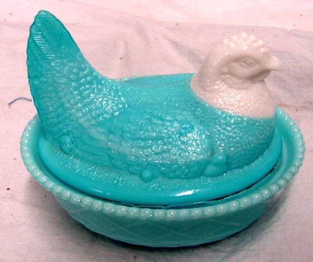 Blue & White Milk Glass Hen & Goose On Nest: Both pieces are unsigned, circa 1890-1910 era, both are blue milk glass animals sitting on blue milk glass bases, both the duck and chicken have white heads. Both pieces have minor nicks on base edge