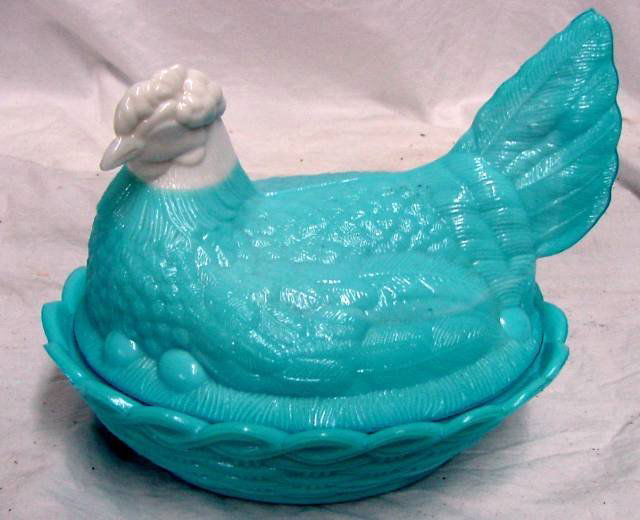 Large Blue & White Hen on Nest: 1880-1910 era, basket woven with over and under pattern in the glass around the edge of the top of the base, the chicken is sitting firmly on the base, no makers marking, 7" long by 6" tall.
