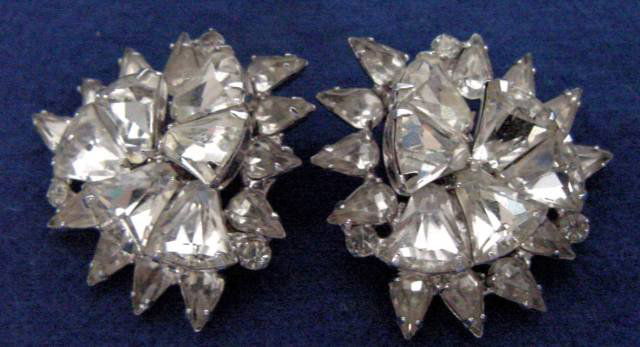 Eisenberg Rhinestone Earrings Large: Signed Eisenberg, close to 1 1/2" wide, triangular, pears and round shape, clip backs, elegant and certainly eye catching.