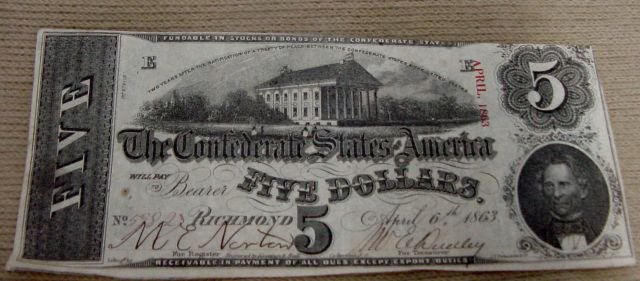 1863 Confederate $5 Paper Bill: Engraved by Keatinge & Ball of Columbia, S.C., red stamped April 1863, wavy Five in left side, descended in the family of the Chaplain of Cumberland Gap, 11th Reg. Tenn. Vols.