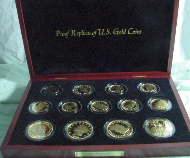 Proof Replicas of US Gold Coins: Proofs of American $20, $10 and $5, all different styles, eras and types, marked .999 Fine Silver Plated with 18K gold F335, total of 13 coins. Presented in a fitted Mahogany box.