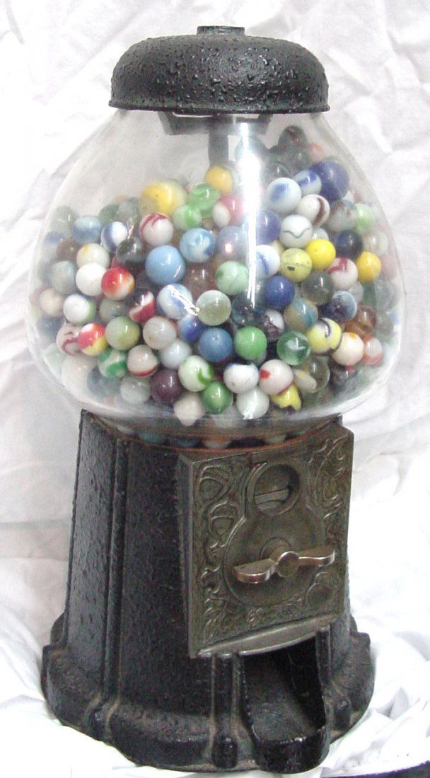 Vintage Gum Ball Machine Marbles: Probably 1930s era, no makers marking, seemingly all original, currently filled with marbles from the 1940s or 50s era, No key or way to get into the bank, textured surface to the black metal surface,
