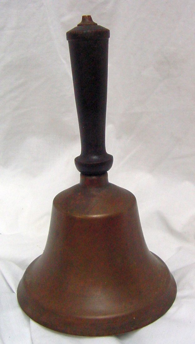 19th Cent. Brass School Bell: Probably 1875-1900 era, excellent condition, no cracks to the bell, 6" across on the bottom and 9 1/2" tall to the top of the handle.