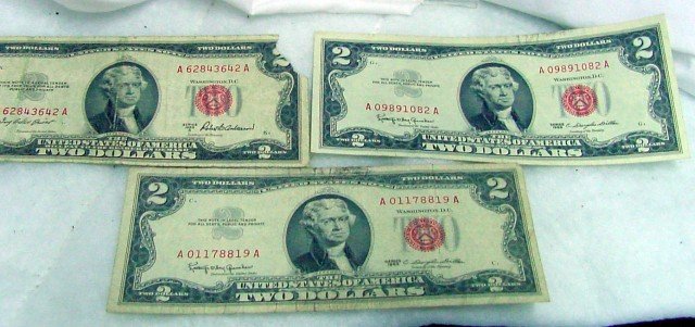 3 Red Seal $2 United States Notes: 3 bills, all $2, all from Washington D. C., 1 1953A with torn right corner signed Robert Anderson, 2 1963 signed C. Douglas Dillon.