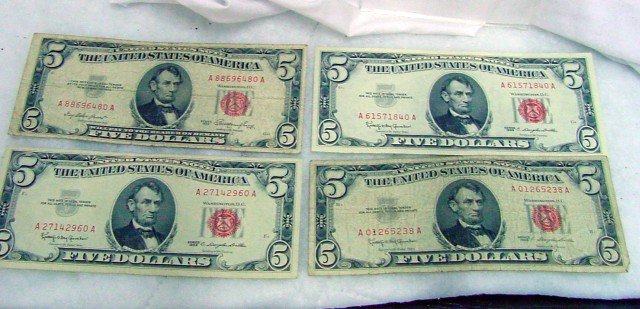 4 Red Seal $5 United States Notes: 4 bills, all $5 with red seals from Washington D. C., signed C. Douglas Dillon, United States Notes, all 1963.
