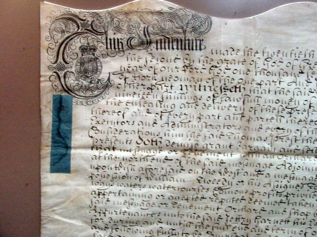 1735 British Indenture Deed York County: Made between Thomas Prest and Jeffry Garnett in the town of Appleton in the County of York, England, 1735, an early deed handwritten on vellum, red wax seal intact, 27 3/4" wide by 19" tall, framed di