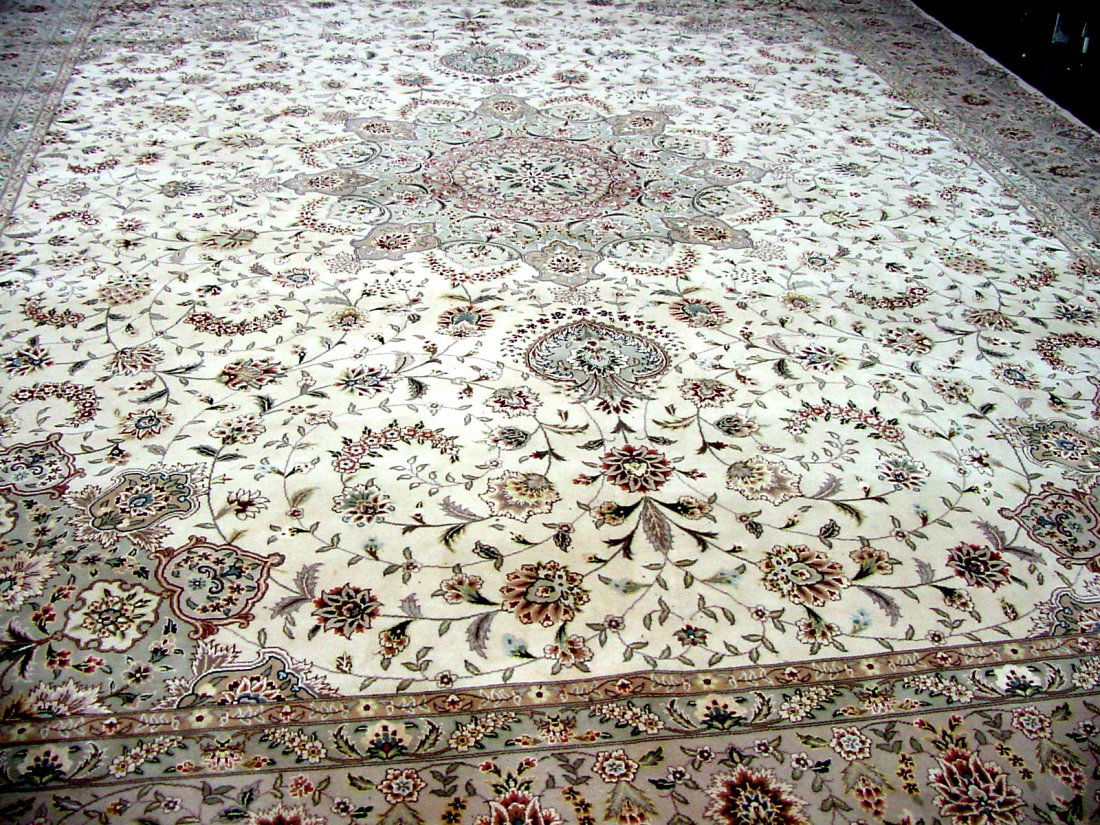 Room Size 12 x 15 Wool Oriental Rug: All wool, 12 x 15, some side moth damage, probably this rug is from the 1980s era, unusually clean, off white, or beige colors, floral motif, no signs of pets, this is a clean, attractive rug ready to