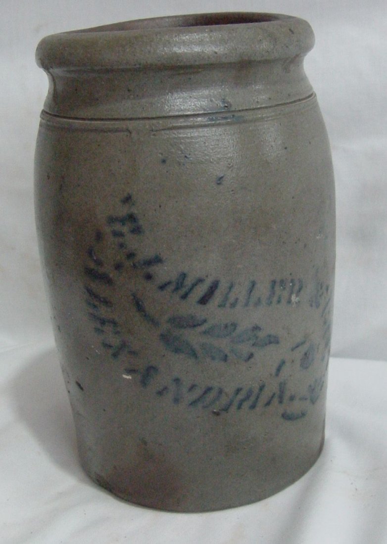 Miller Alexandria Cobalt Crock: Stenciled on the front appears to be F. I. Miller & Co., Alexendria in cobalt blue colors, hairline crack extending from the top down one side, second crack coming down from the top, third crack, none