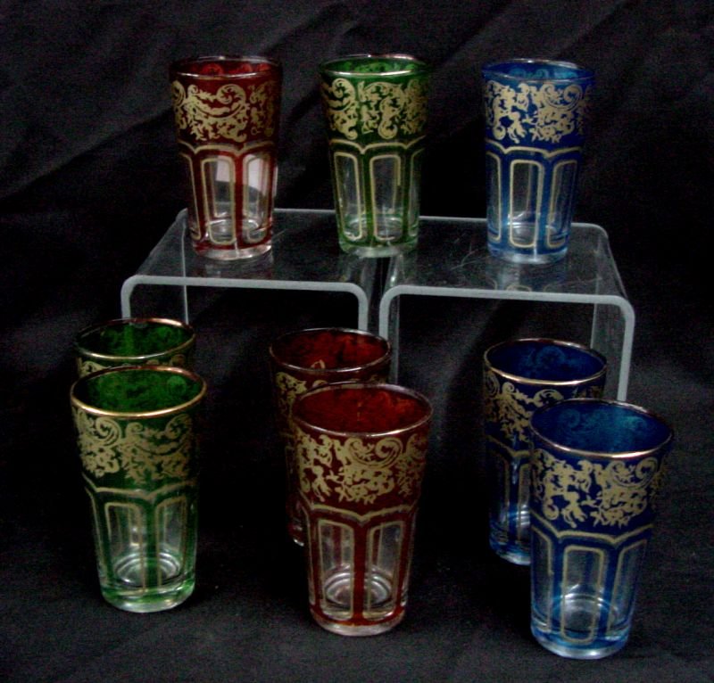 8 Bohemian Style 1950s Glasses: Blue, Green & Red with gold designs on these 8 Bohemian or Italian style drinking glasses, 4" tall by 2 1/2" wide, no visible chips or cracks. Probably 1950s era.