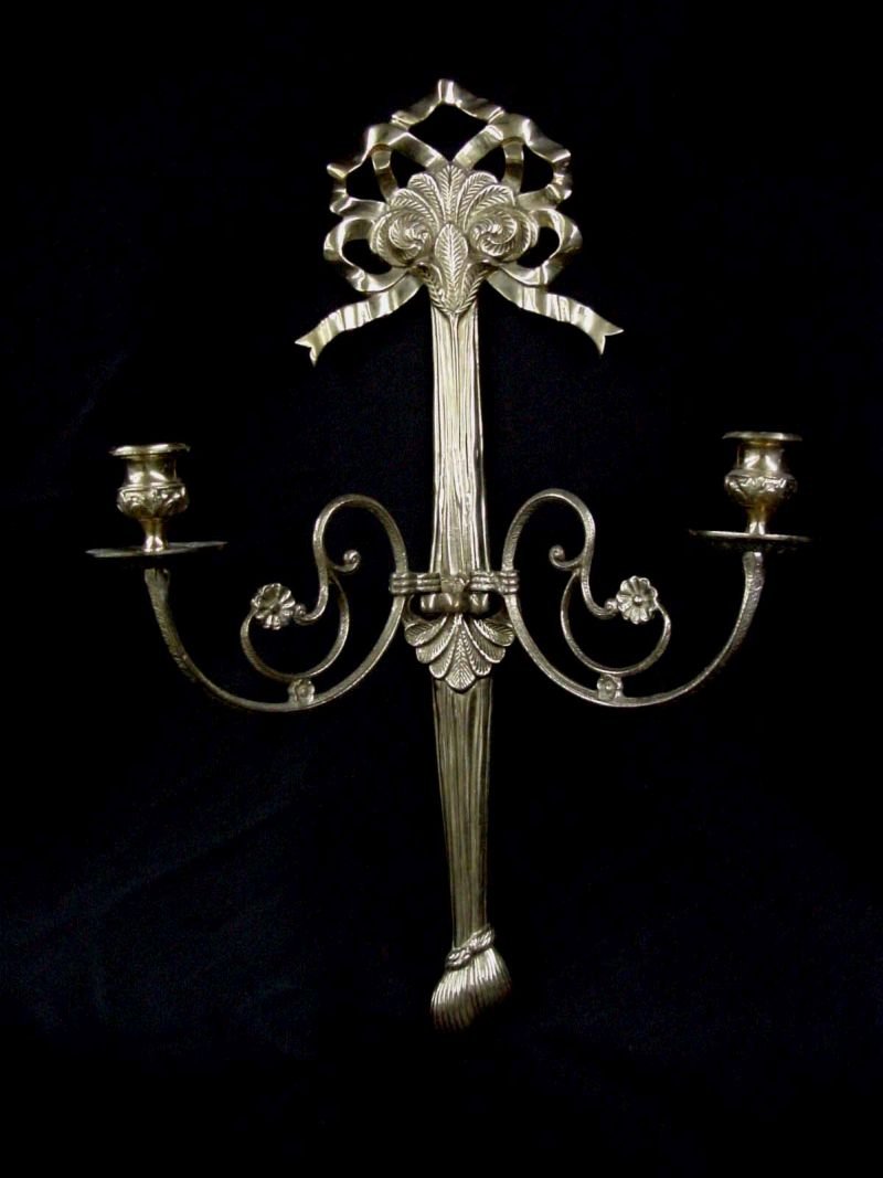 Brass Wall Sconce Twin Candle Holder: Never wired, probably a high quality 1950s replica double candle holder with ribbons, leaves and tassel decorations, 21" tall by 13" wide and 8" deep. This is an unusually high quality, cast brass fix