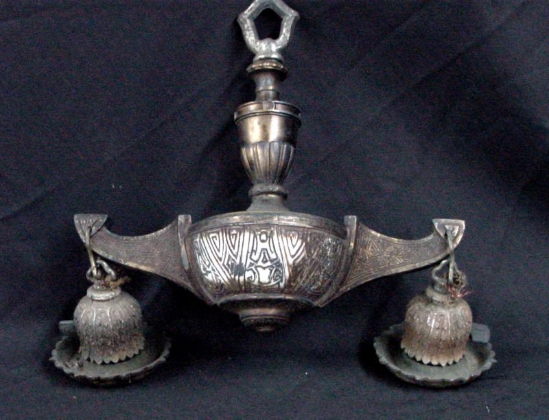 Double Hanging 1930s Ceiling Light Fixture: Ornate leaf bulb covers, twin sockets, ornate center bowl with 2 hanging drop decorative lighting units, pure 1920s or 30s that never took shades, brass plate, width is 15", height is 14", structurall