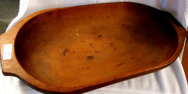 Poplar Handmade Dough bowl Oblong 1850s: Handles on each end, the planer marks visible, 20" long by 10" wide by 3 3/4" tall. Poplar wood, old refinished surface, excellent condition, no splits.