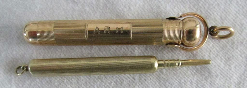 2 Art Deco Necklace Pencils: Both are yellow gold filled, both are 1910-1930 era and have hanging loupes for necklaces, one is monogrammed, one is not, these were usually worn on a long chain with the wearer having the ability to