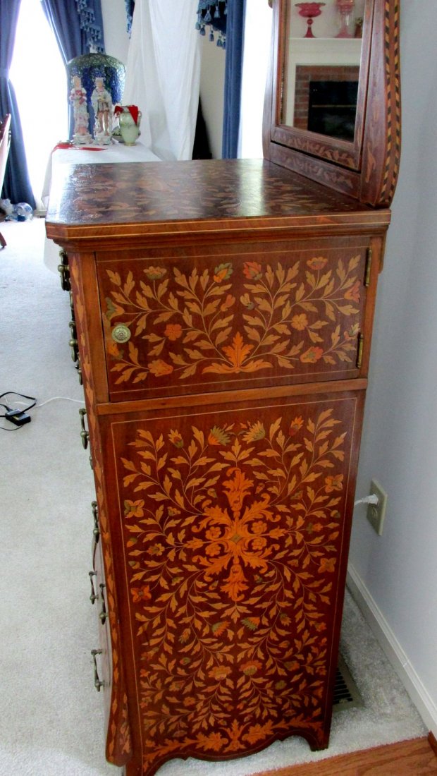 Dutch Bombay Inlaid Shaving Stand: Mahogany case with ornate inlay of various woods, each of the drawers is inlaid with a barber pole or rope design, all original pulls, the front right top section on the right side pulls out and is hi