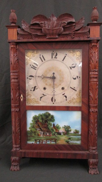 Mitchell & Atkins Conn. Wooden Works Mantle Clock: Ca. 1830-45, wooden works, painted wooden face, painted landscape tablet that may be an old repainted surface, 17" wide by 30" tall by 5 1/2" deep. There are well carved paw feet on the front with toe