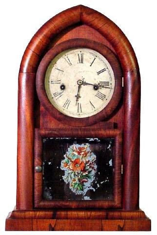 Waterbury Rosewood Round Gothic Time Piece, 19th: Original Painted Tin Face w/Roman Numerals, Some Surface Flaking, Original Label For Waterbury On Back Plate, Original Center Floral Painting w/Missing Blue Background, Good Condition To Veneer, Proba