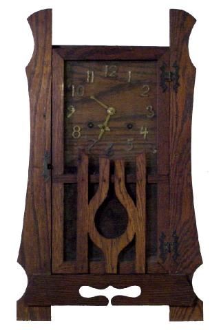 Mission Oak Mantel Clock: Circa 1910, This Old If Not Original Finished Oak Mission Style American Clock Is Unknown As To The Maker, Almost A Stylized Lyre in The Front Door, Brass Letters On The Oak Face, 20 1/2 Tall by 12 1/