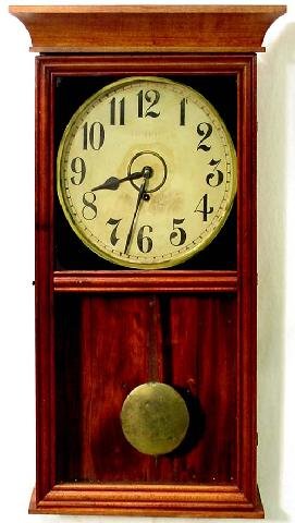 Coca-Cola Gilbert Model 3022 Wall Clock: Red Stained Mahogany Finish On Either Poplar Or Fruitwood, This Original Wall Clock Has A Black Reverse Painted Top Glass w/Gold Ring Around The Face, On Original Face, Faded Red Letters Drink Coca Co