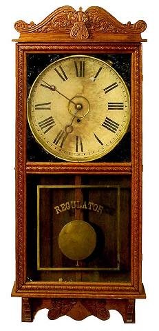 Gilbert Observatory Wall Regulator Clock: A Variation On The Gilbert Observatory Regulator w/Very Minor Variations, Time Only, Oak Case, Dimensions 36 Tall by 15 1/2 Wide, Base Shelf Intact, Parts Of Original Label Intact On Back, Reverse Pai
