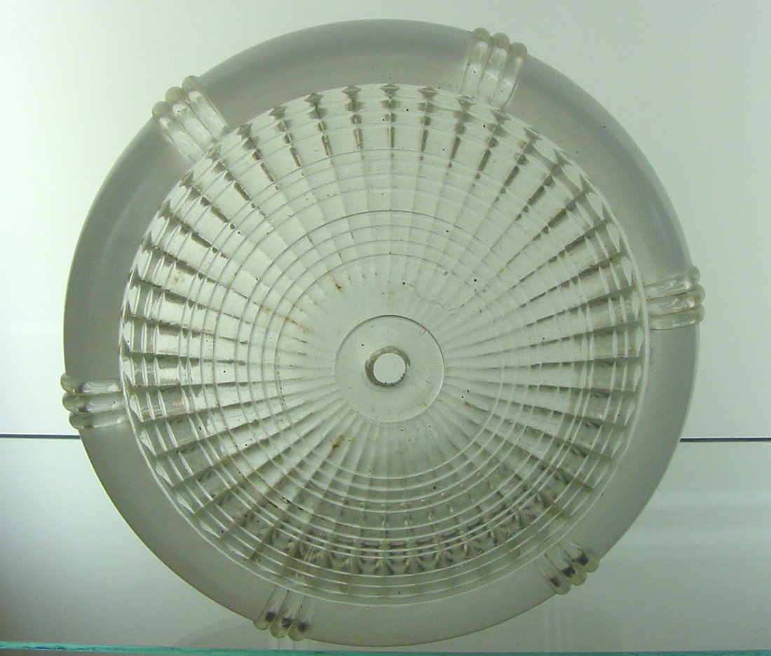 Ribbed Paneled Ceiling Shade: Ceiling fixture, clear and frosted, 10" wide by 4" tall, ribbed and clear panels with center attachment, chip on one rib.