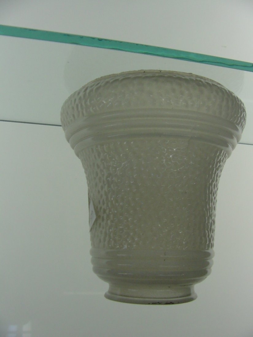 Bell Shaped Gas Shade: 2 1/4" Fitter, 5" tall and 4" across base, bell shaped, white over pebble finish with concentric circles both top and bottom.