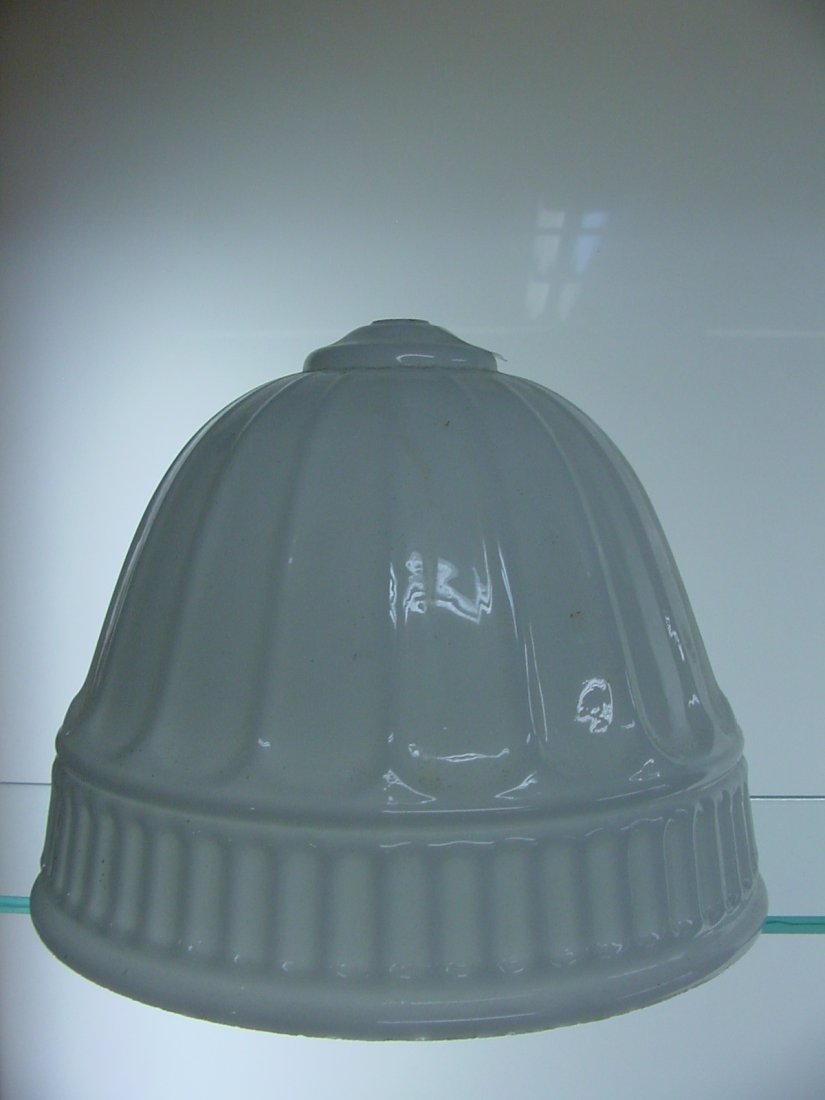 Ceiling Shade: 9" fitter to the ceiling with center, 7" tall with small hole for threaded rod attachment, paneled rib designs, milk glass. Slight roughness to upper rim, maybe mold flaws with slight nick on edge.