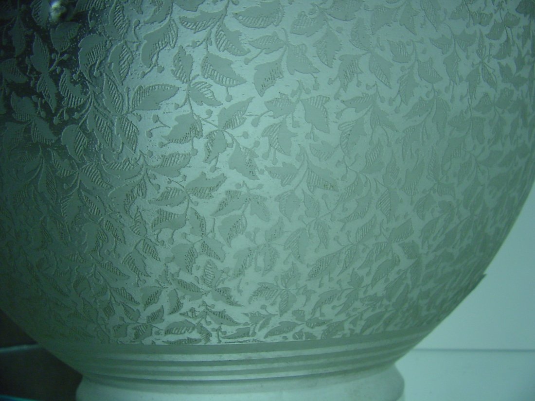 Acid Cut To Clear Shade: 4" fitter, 3 3/4" tall, 8" wide, acid etched in a leaf design, either a column lamp or ceiling fixture, bubbles in glass, minor nicks around the base and fitter.