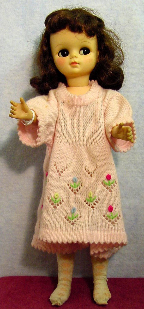 EFFANBEE doll: 17 in. tall vinyl head and arms on a plastic body, she has brown side glancing sleep eyes with upper lashes, closed mouth, dark brown rooted hair. She is jointed at the shoulders and hips. Overall in