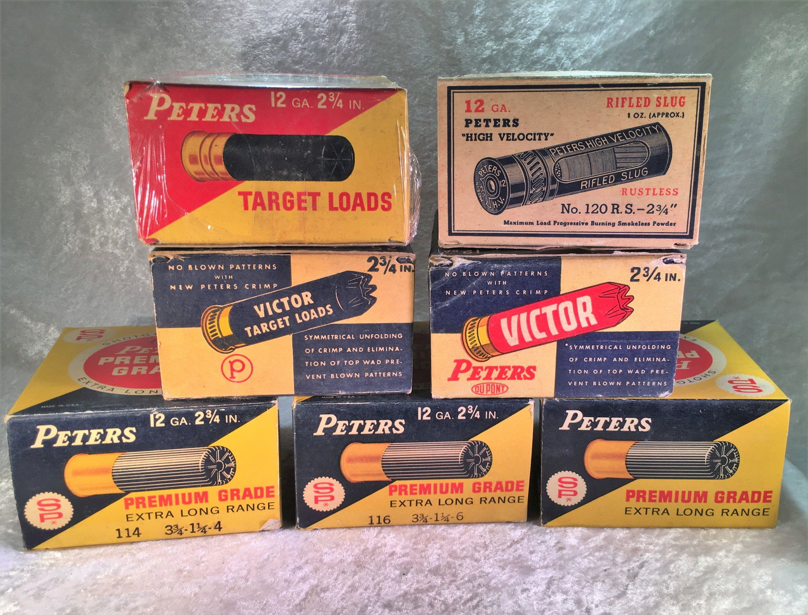 (7) Vintage Peters Victor & Premium Grade 12 Ga. One: (7) Vintage Peters Victor & Premium Grade 12 Ga. One Piece Shotgun Shell Boxes. (4) Full Boxes Victor Field Loads, Premium Grade, (9) Loaded Shells High Velocity Rifled Slug. Victor Target Loads Empty