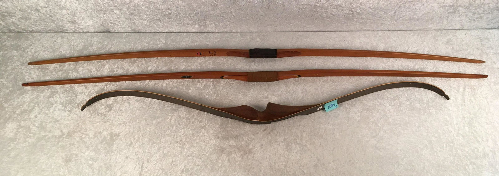 Group of (3) Vintage Bows. Susquehanna Buck Recurve Bow: Group of (3) Vintage Bows. Susquehanna Buck Recurve Bow 48#, 58", Woodcraft Long Bow 25#, 64" & J.C. Higgins Long Bow 48#, 66"