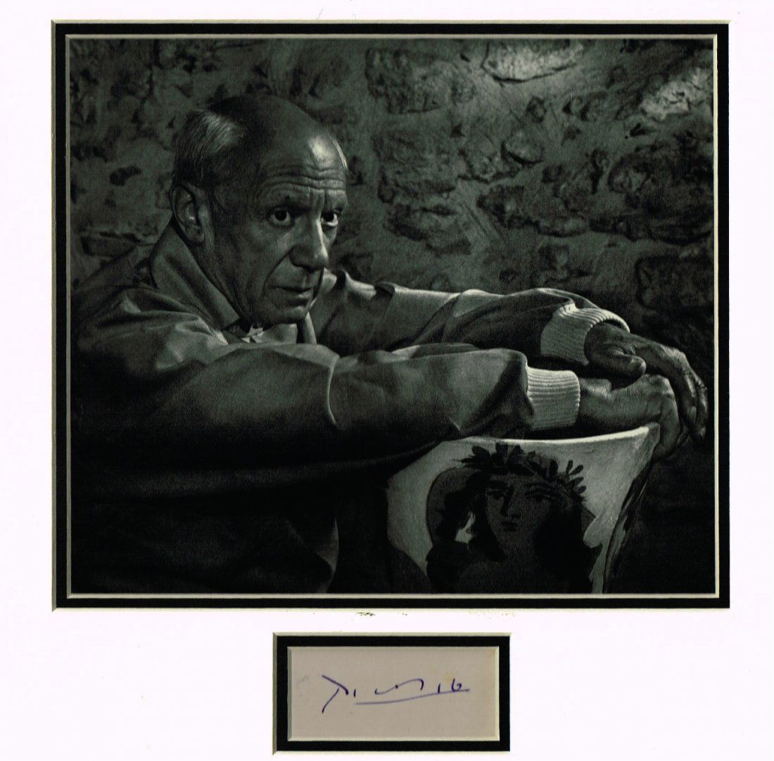 PABLO PICASSO.: An autographed piece of paper from Pablo Picasso, along with an image of the artist together in a mount.