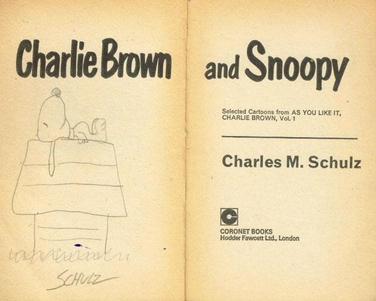 CHARLES SCHULZ DRAWING OF SNOOPY IN BOOK. (1 of 1)
