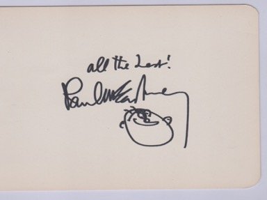 Paul McCartney.: A 15 cm by 10 cm album page with a signature and doodle by The Beatles Paul McCartney in black sharpie type pen with “ All the Best ! “ above the signature. This is a fine signature