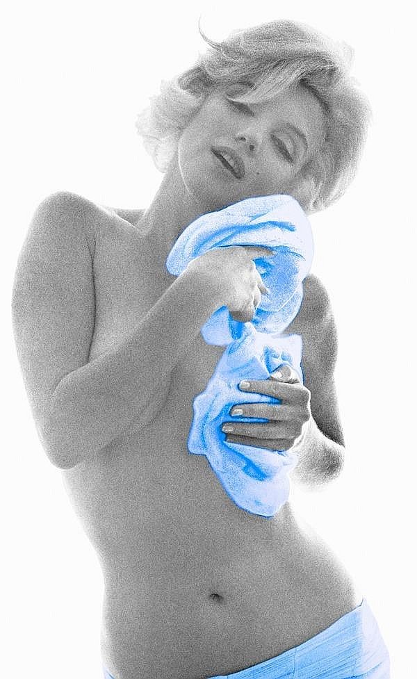 BERT STERN SIGNED: MARILYN MONROE CUDDLING BLUE ROSES.: BERT STERN: MM CUDDLING BLUE ROSES.Heavy archival matte photo paper. Printed between 2011-2013. 11.5X18.7 inches. Pigment print. Edition of 50. Copyright stamped on the verso. Bert Stern signed.