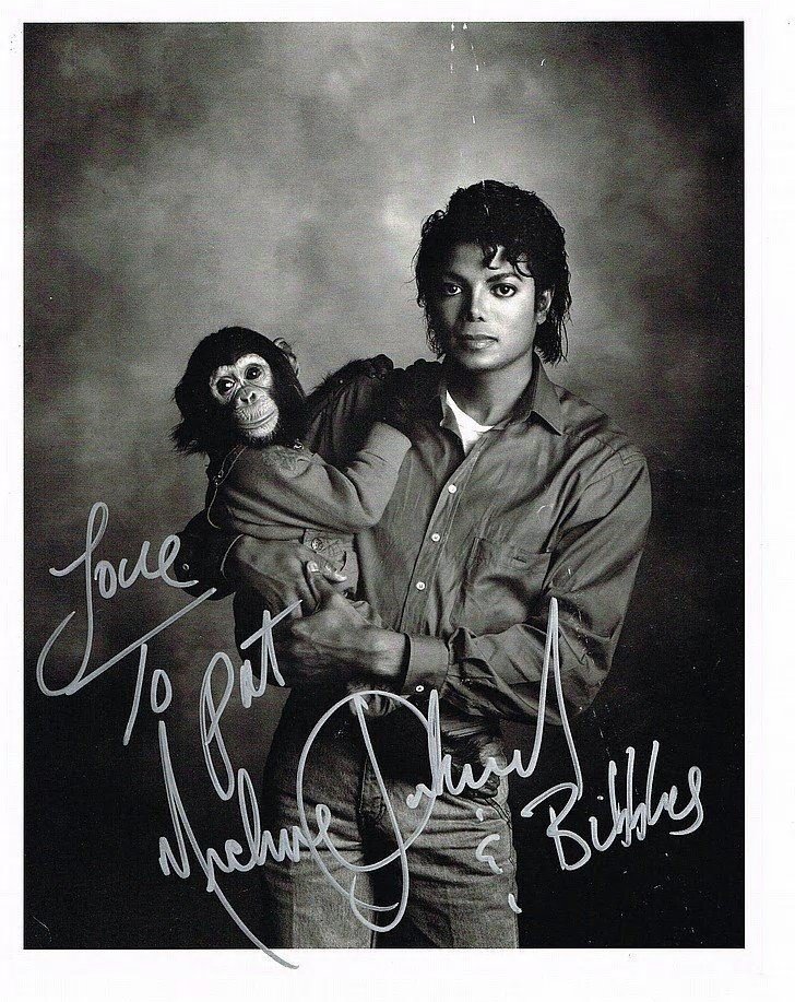 MICHAEL JACKSON INSCRIBED MJ AND BUBBLES PICTURE. (1 of 2)
