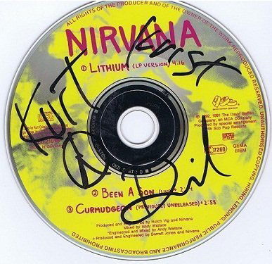 NIRVANA SIGNED.: Nirvana autographed CD Signed by Kurt Cobain, Dave Grohl & Krist Novoselic. Despite releasing only three full-length studio albums in their seven-year career, Nirvana has come to be regarded as one of